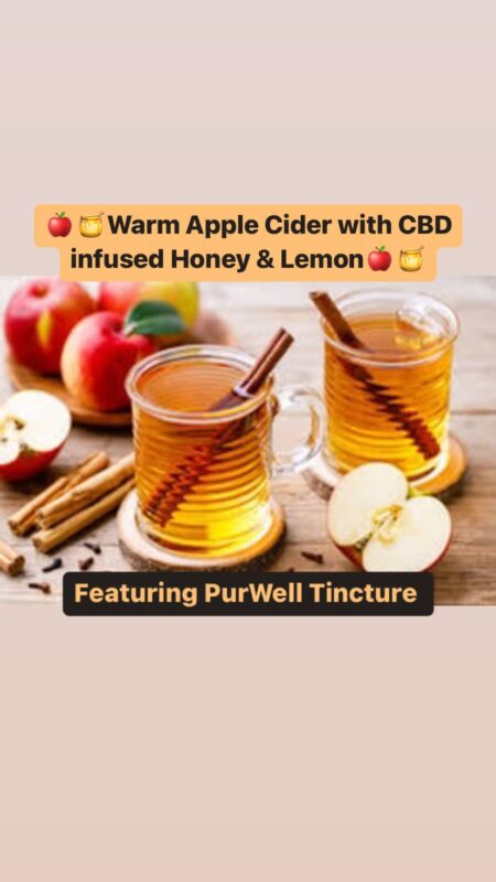 A glass of delicious apple cider infused with cbd honey and lemon.