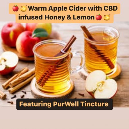 A glass of delicious apple cider infused with cbd honey and lemon.